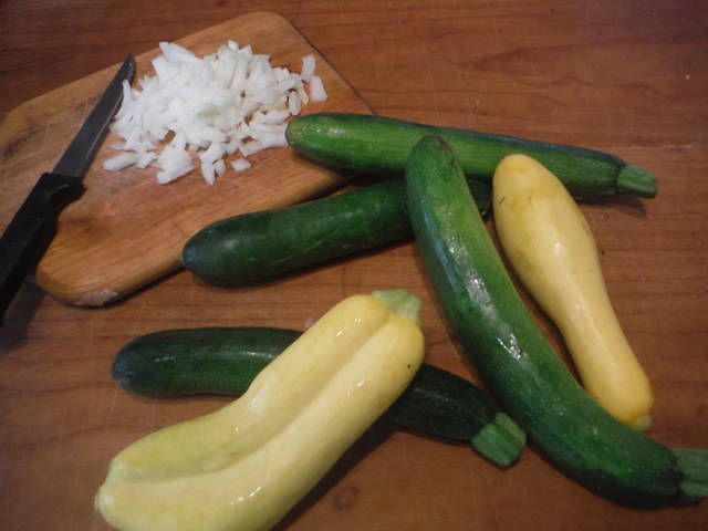 This green zucchini and yellow squash came from the Farmers Market in Wilkes-Barre, and it looks as if theres a set of conjoined twins among the yellow ones. Dont worry, I cut them apart right after chopping the onion.
                                 Mary Therese Biebel | Times Leader