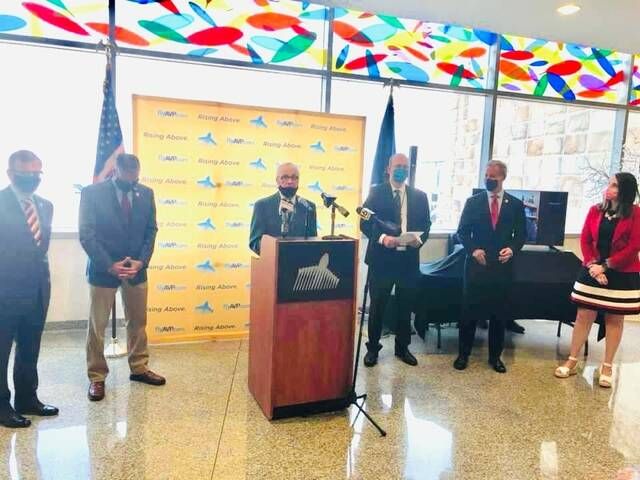 Bi-County Airport Board Chairman Tim McGinley, at podium, welcomes guests to Wednesdays announcement that American Airlines is increasing service at the Wilkes-Barre/Scranton International Airport.
                                 Submitted photo